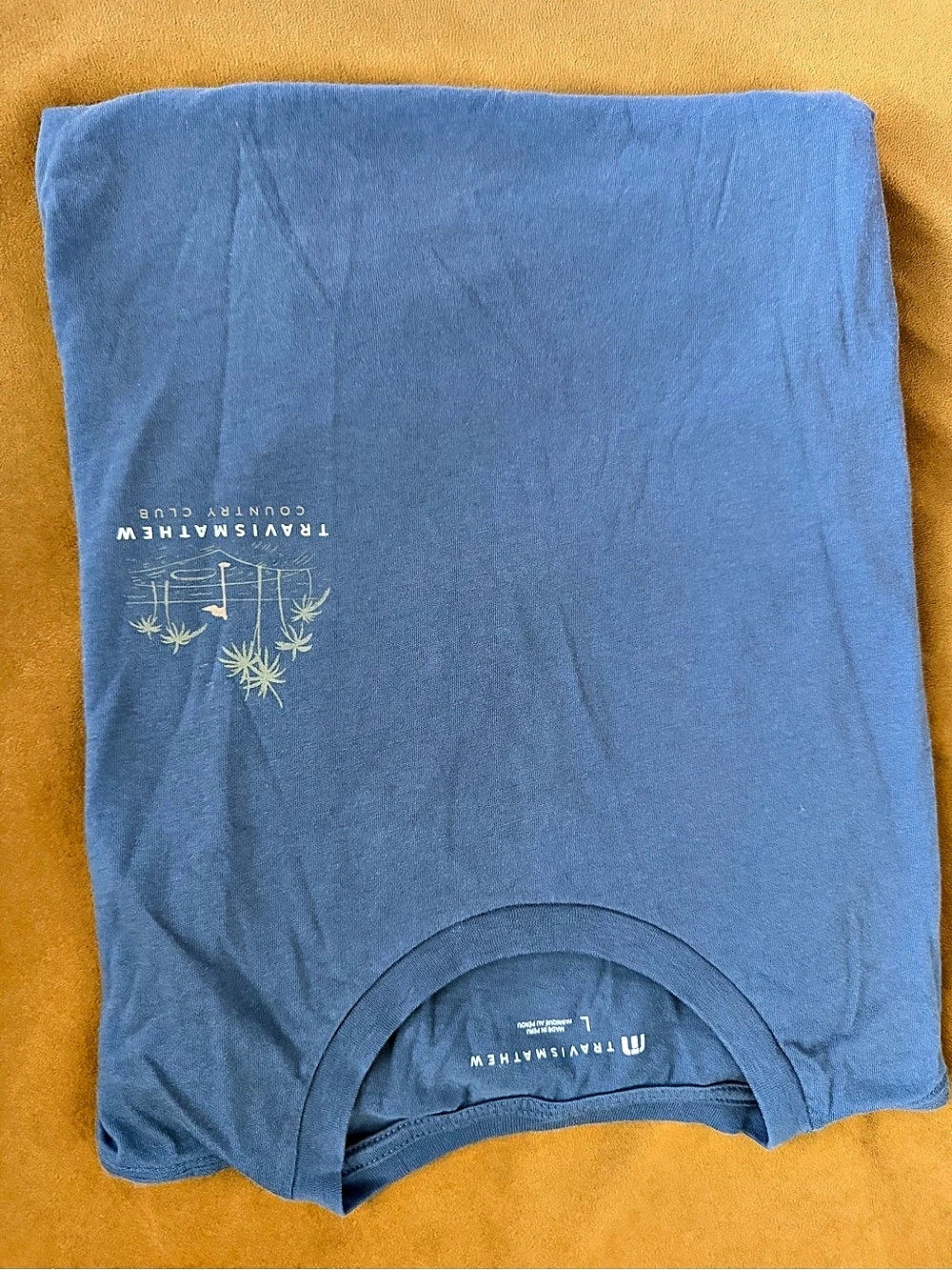 Country Club TravisMathew Graphic Tee in Blue